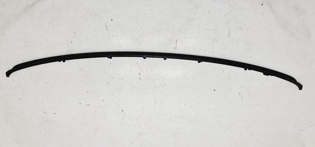 Rear bumper trim bar molding 7135580