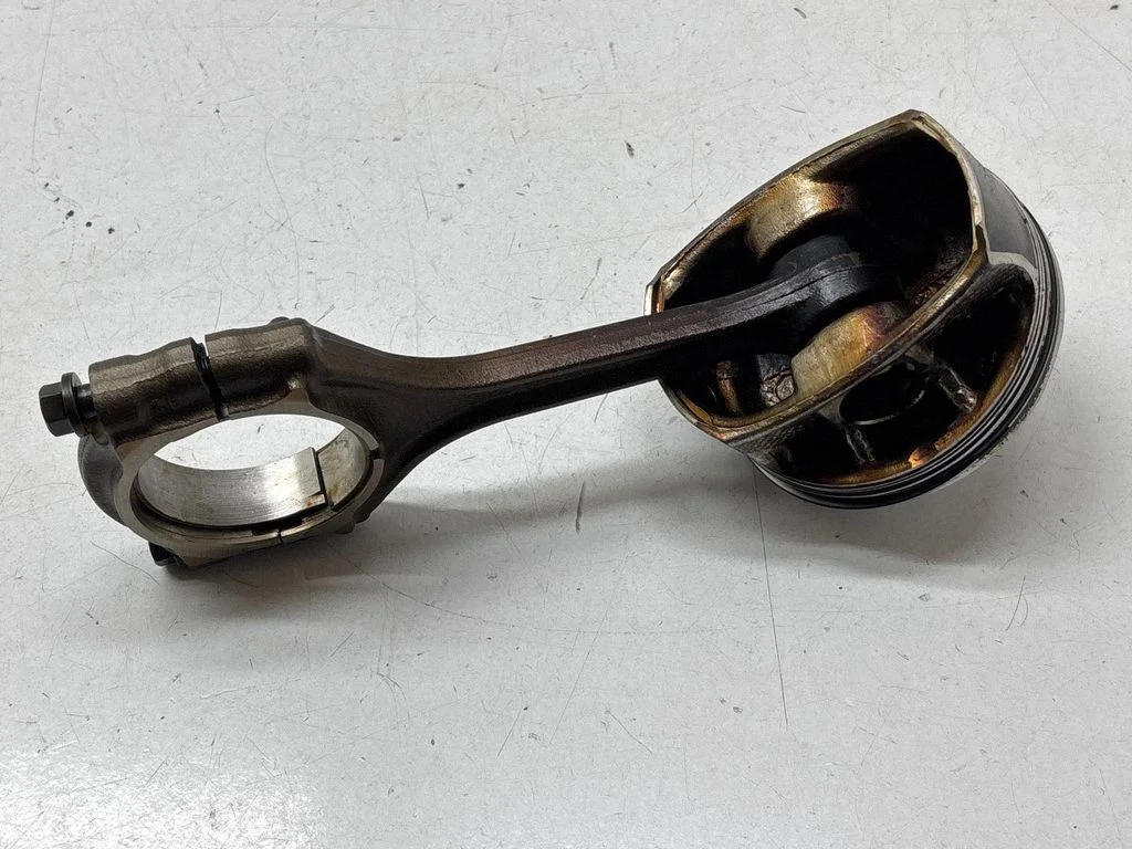 Piston with connecting rod
