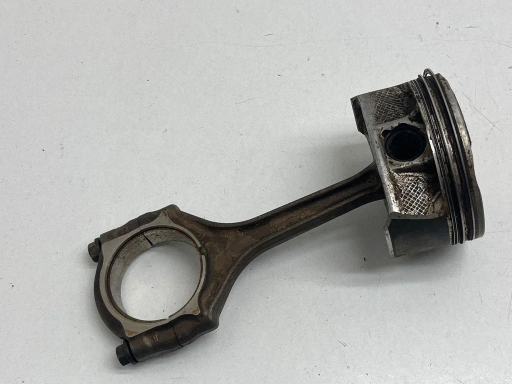 Piston with connecting rod