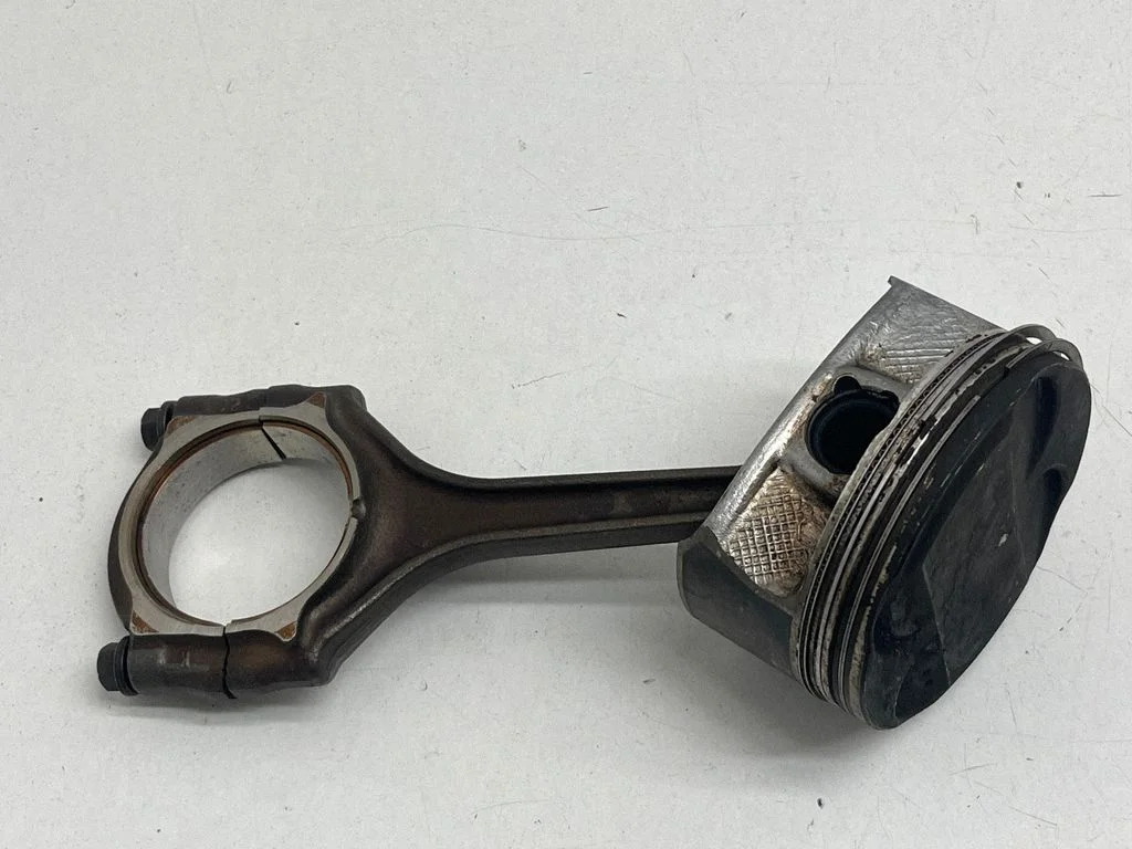 Piston with connecting rod