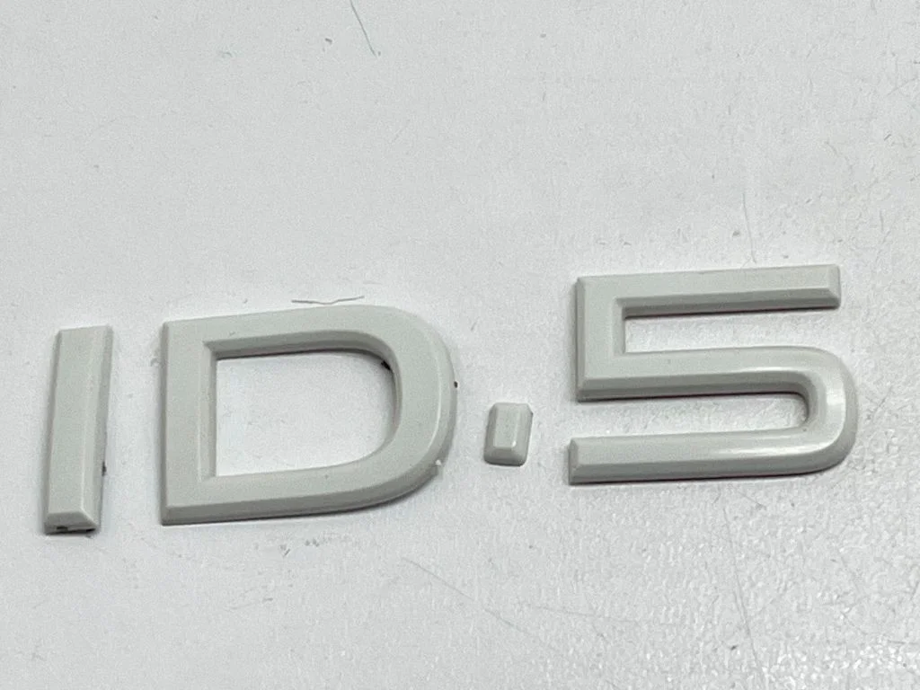 Manufacturers badge/model letters
