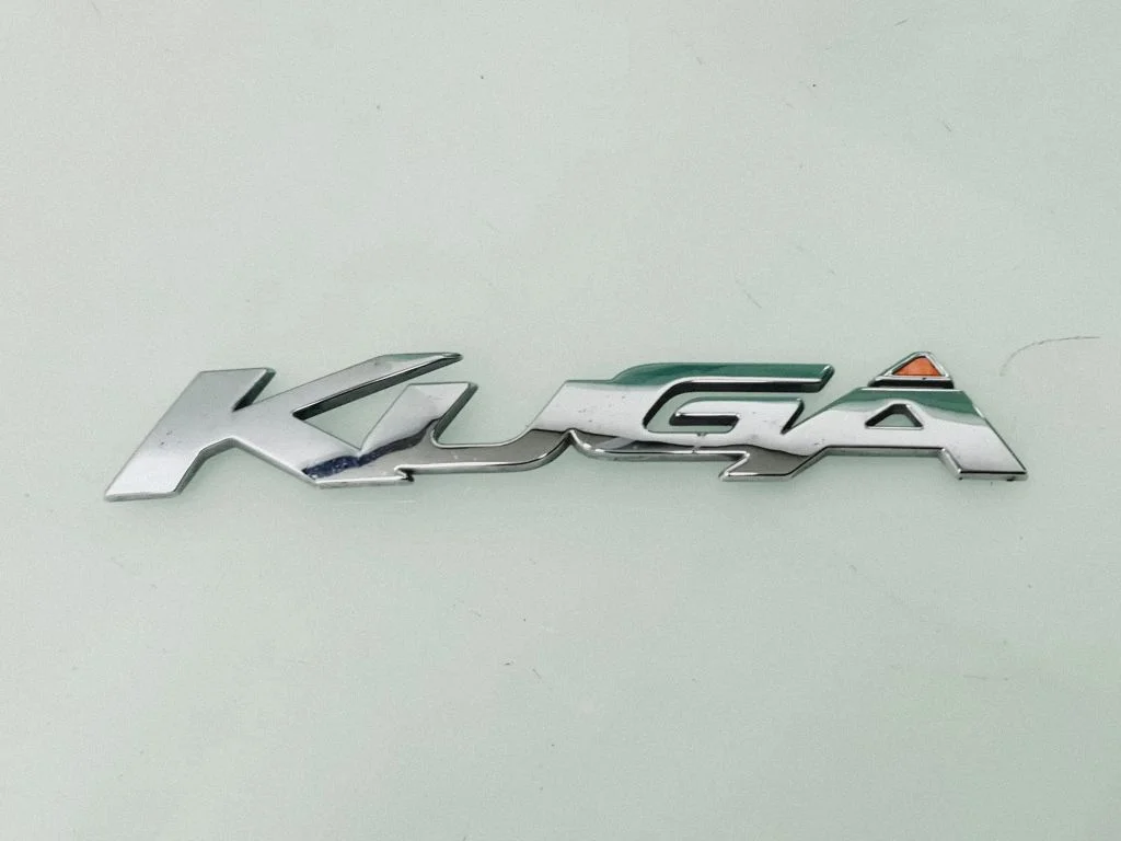 Manufacturers badge/model letters