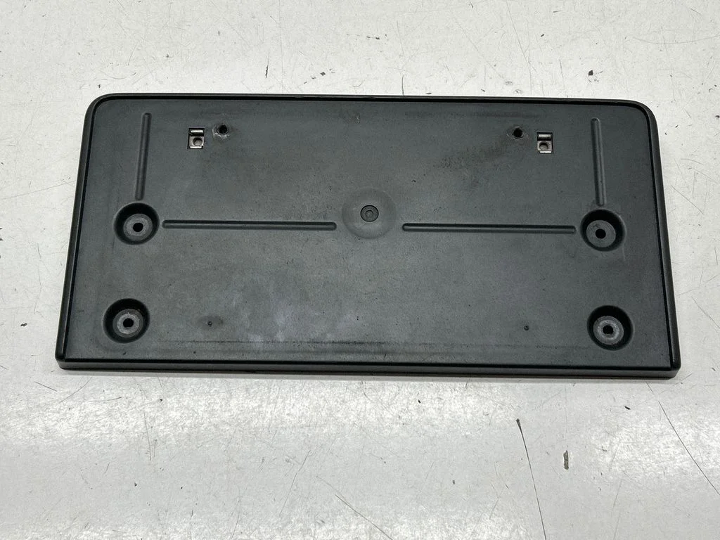 Number plate surrounds holder frame 80A807285