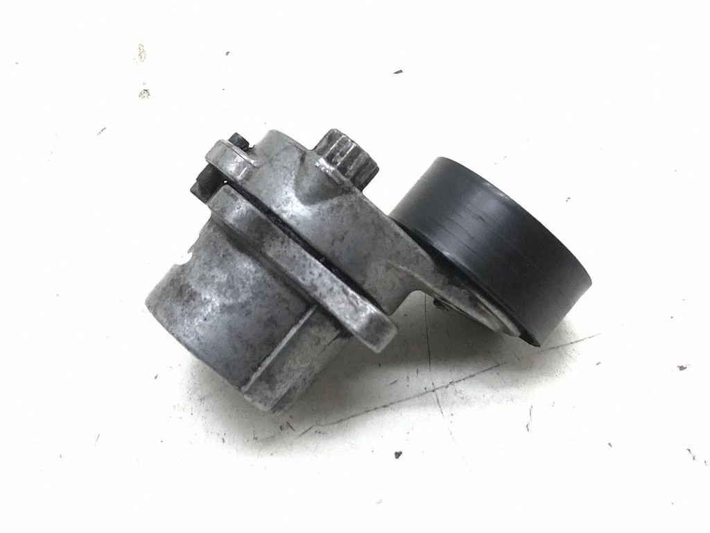 Alternator belt tensioner A6512001370