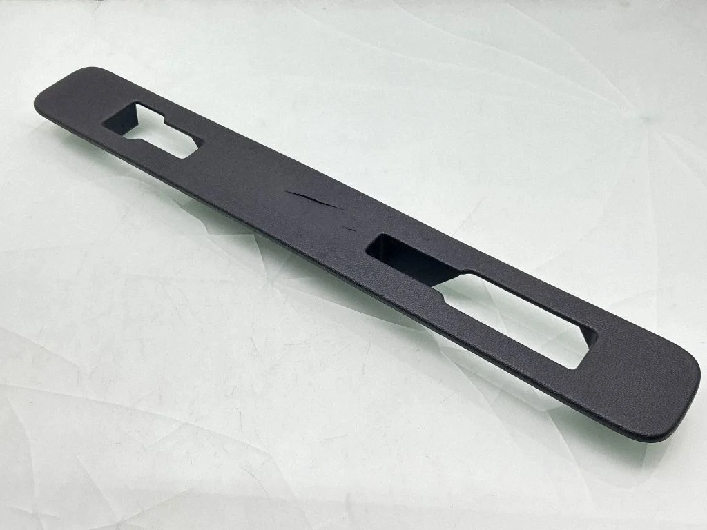 Rear seat rail trim cover 1603778X