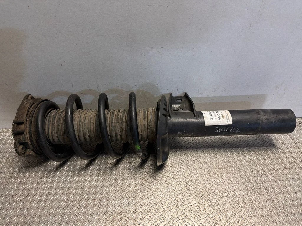 Front shock absorber with coil spring 314883