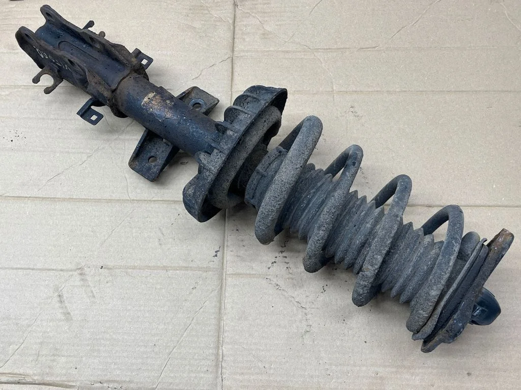 Front shock absorber with coil spring – front right