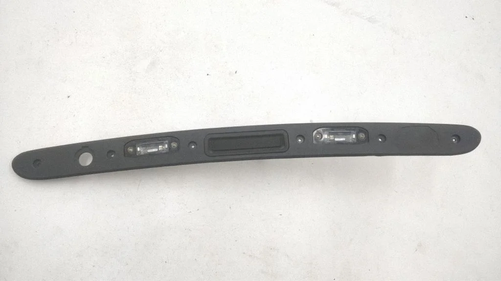 Trunk door license plate light bar 31253640