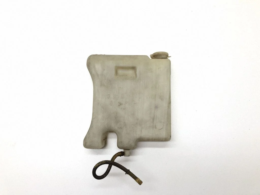 Lamp washer fluid tank – Mercedes-Benz E-Class W210 (1995-2002)