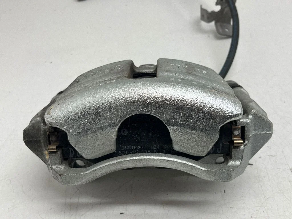 Front brake caliper – front left