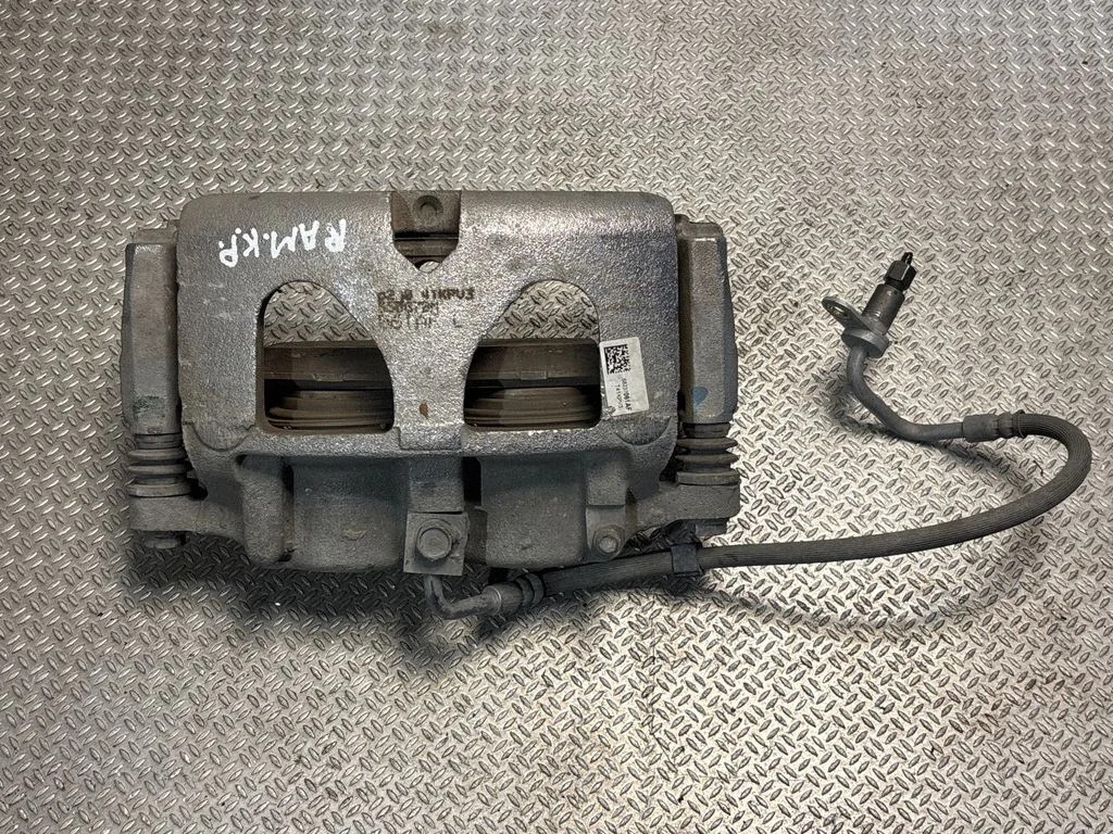 Front brake caliper – Ram 1500 DT (2018-)