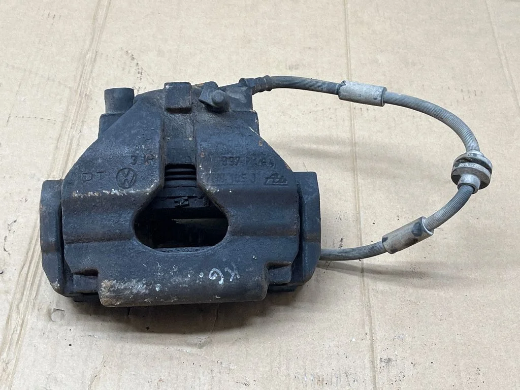 Front brake caliper 7H0615123A