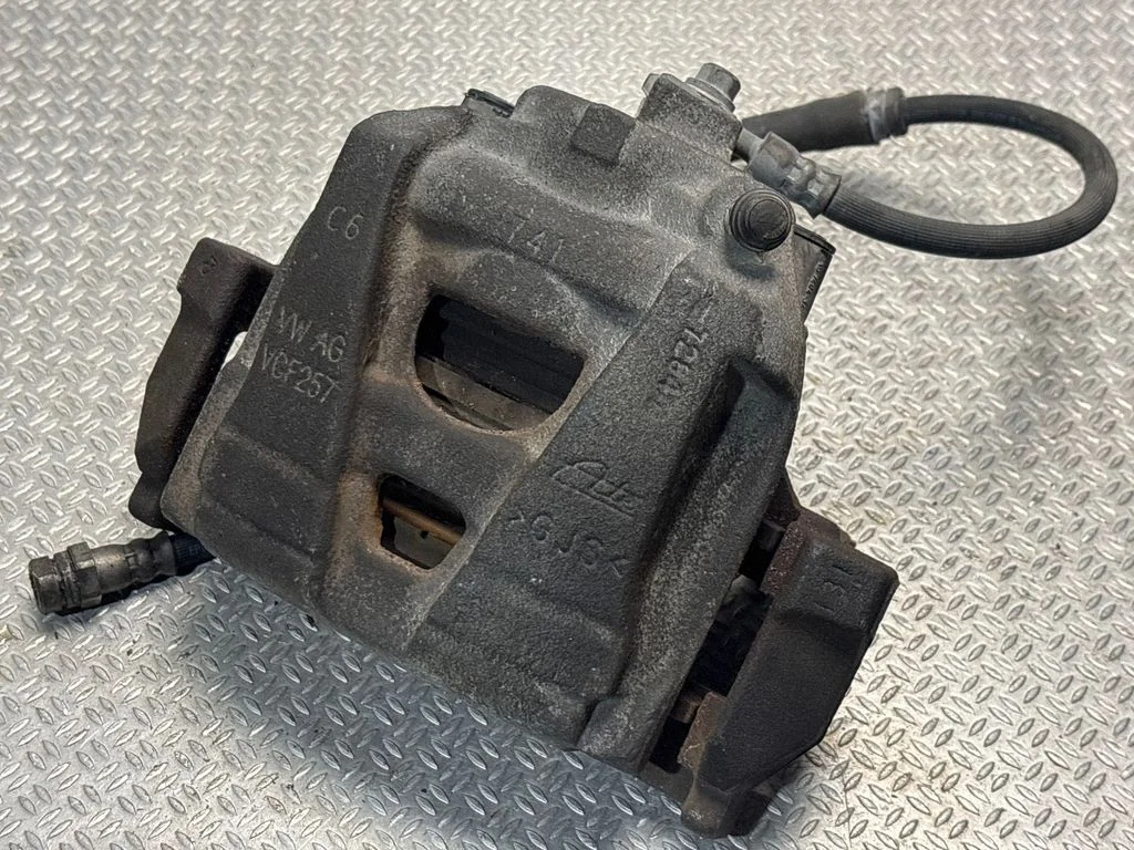 Front brake caliper – left