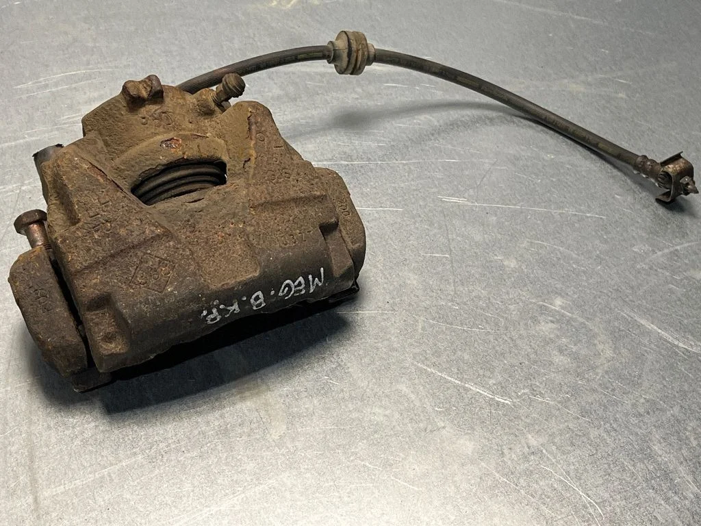 Front brake caliper – front left