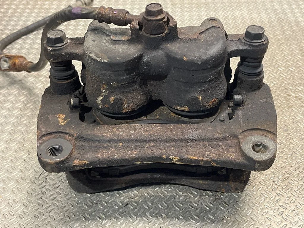 Front brake caliper – front left