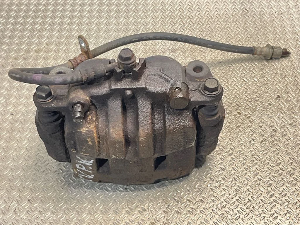 Front brake caliper – front left