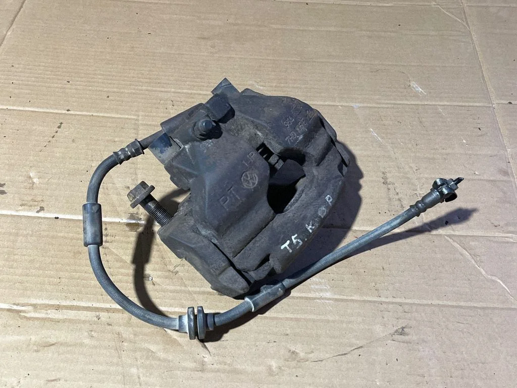 Front brake caliper 7H0615124A