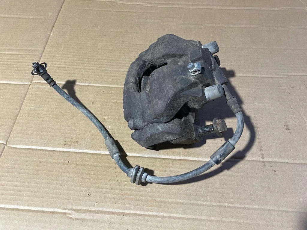 Front brake caliper 7H0615123A