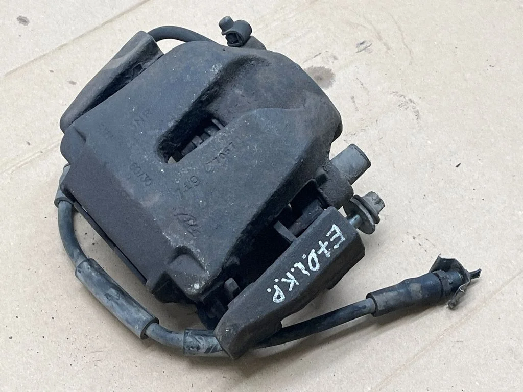 Front brake caliper – front left