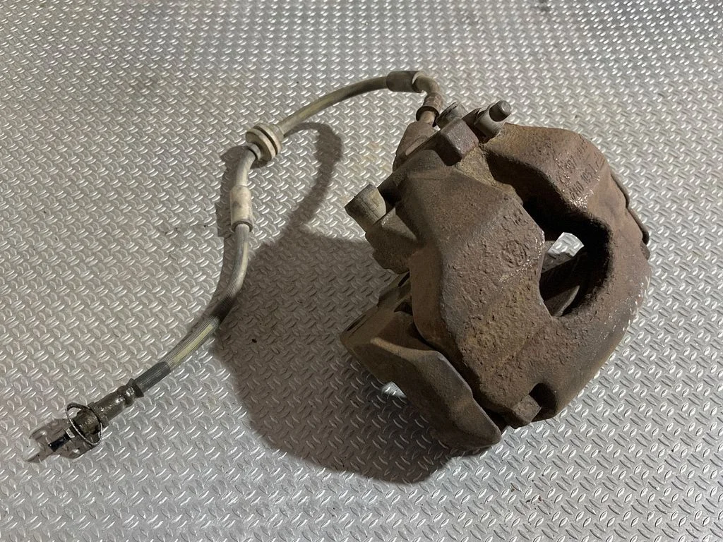 Front brake caliper 7H0615123A