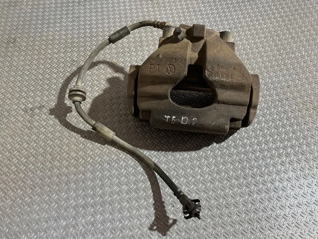 Front brake caliper 7H0615124A