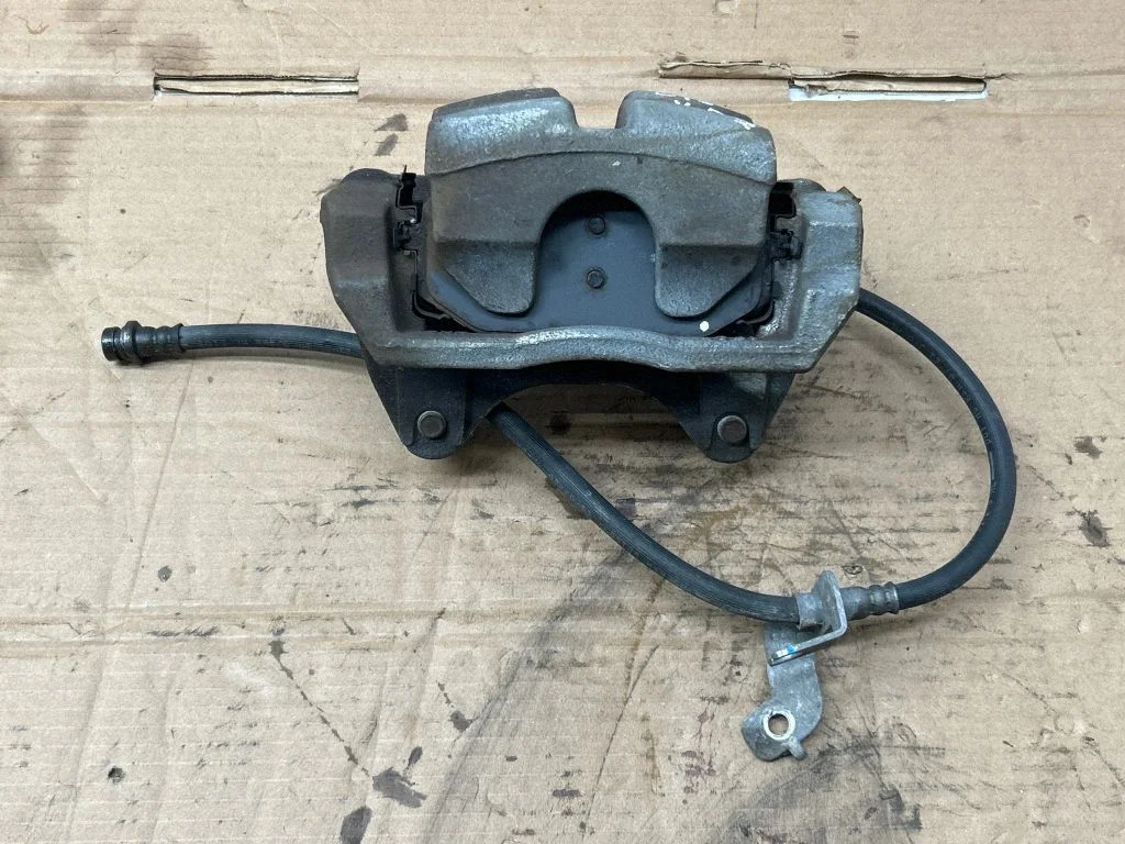 Front brake caliper 58110CV200