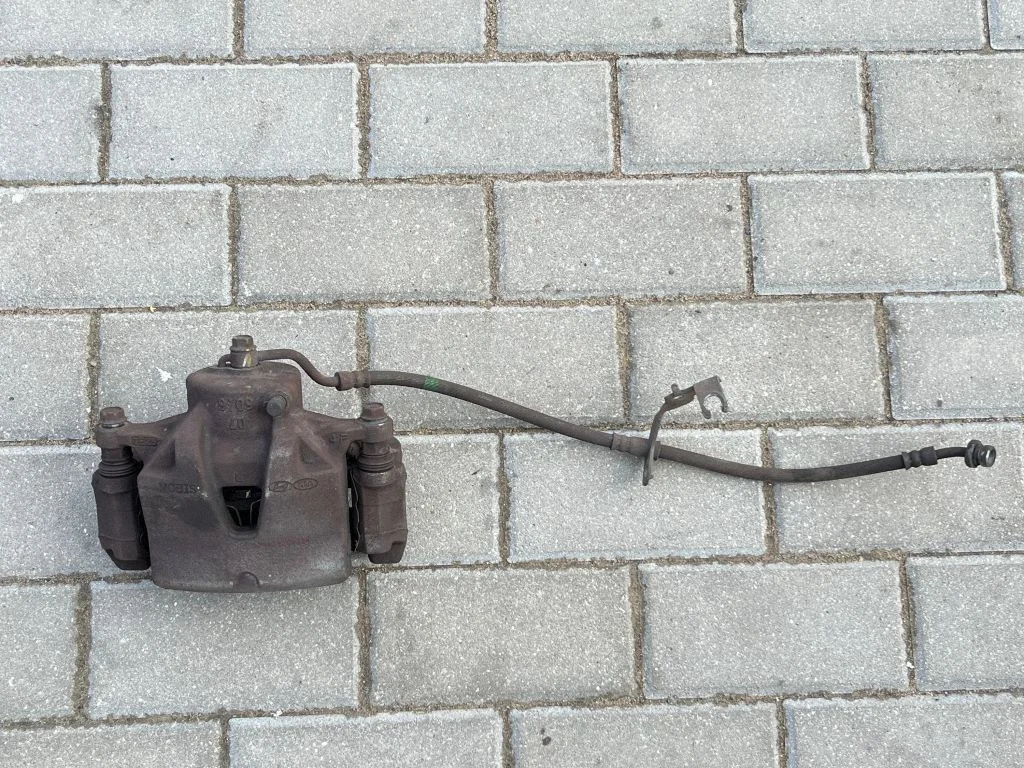 Front brake caliper – front left