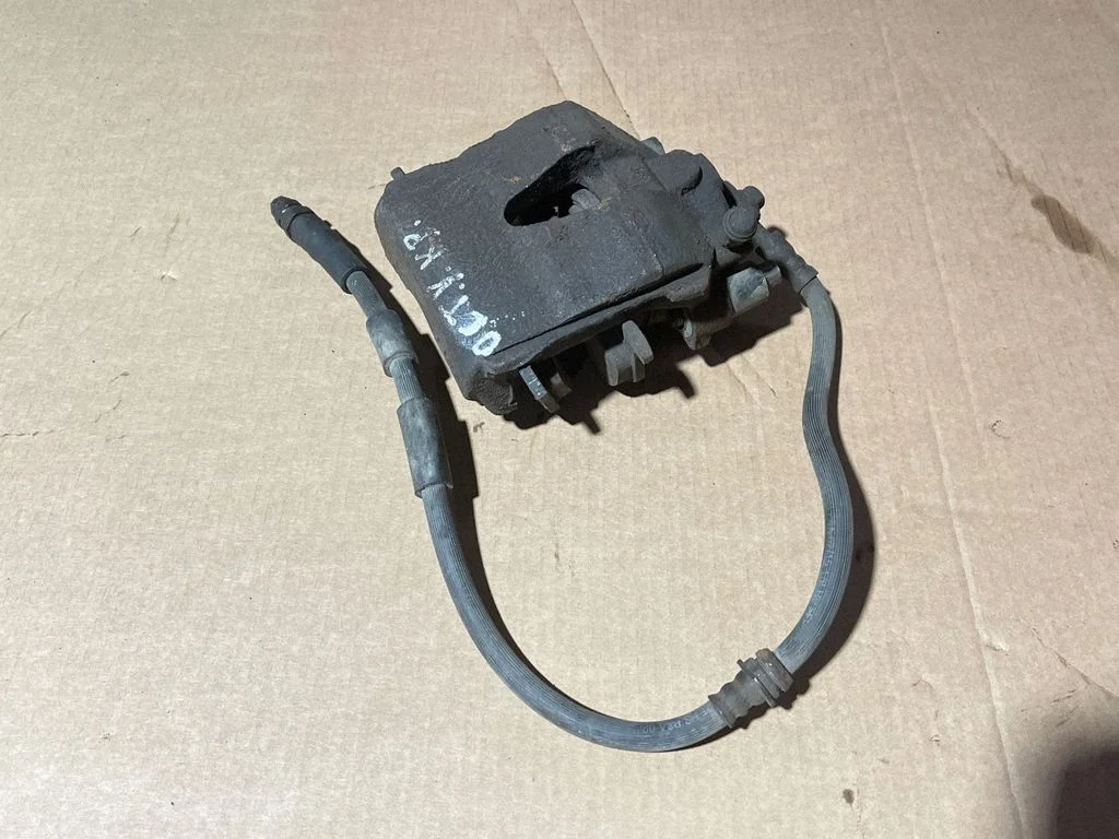 Front brake caliper – front left