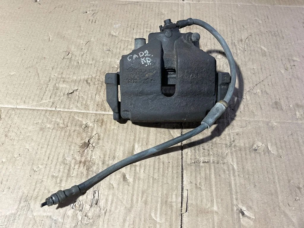 Front brake caliper – front left