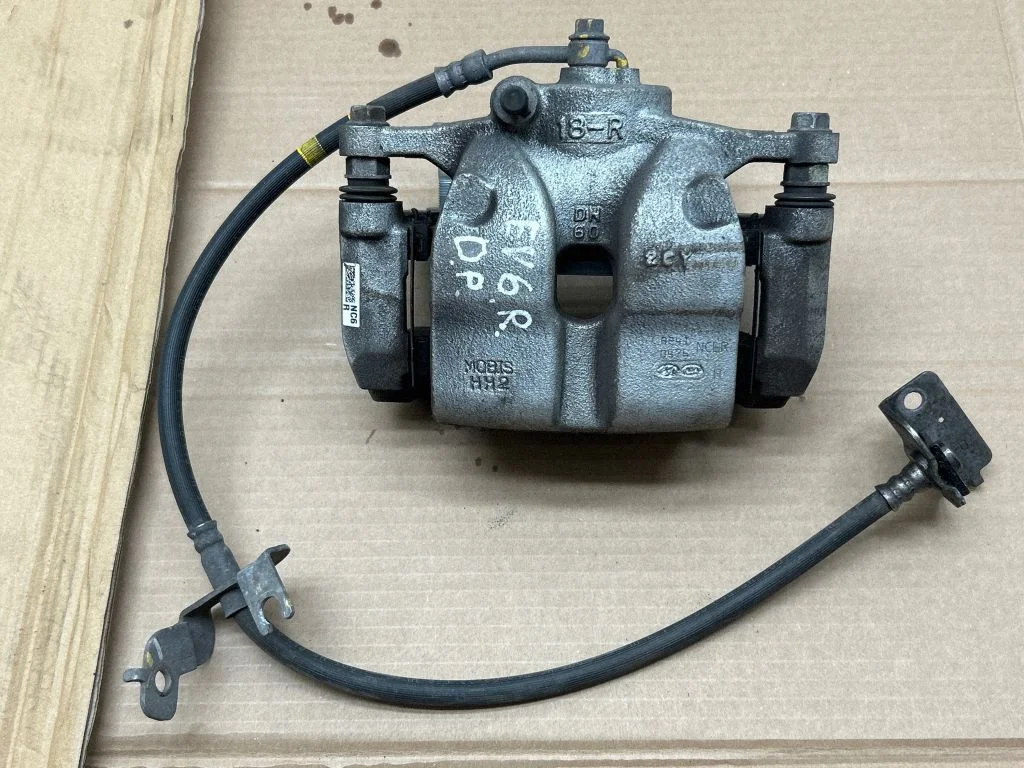 Front brake caliper 58130CV200