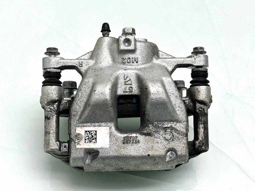 Front brake caliper – front right
