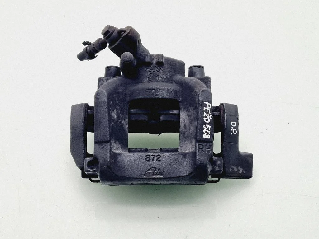 Front brake caliper – front right