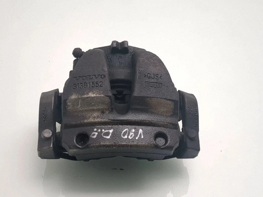 Zacisk hamulcowy przedni 31381552