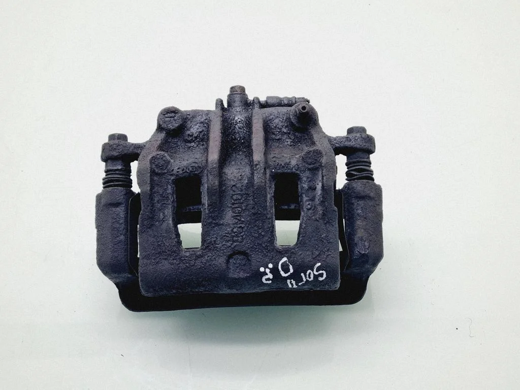 Front brake caliper – front right
