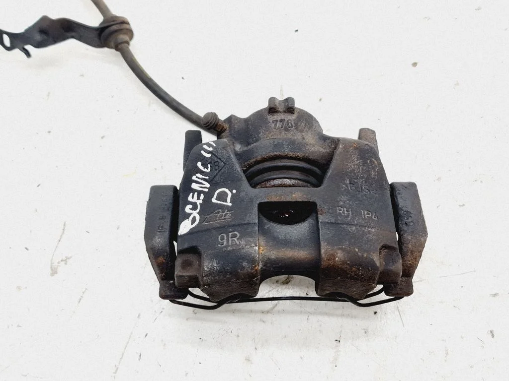 Front brake caliper – front right
