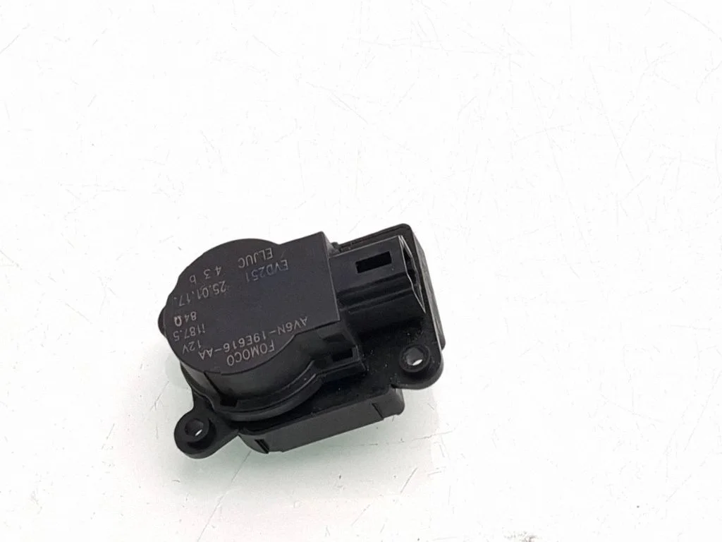 Air flap motor/actuator AV6N19E616AA