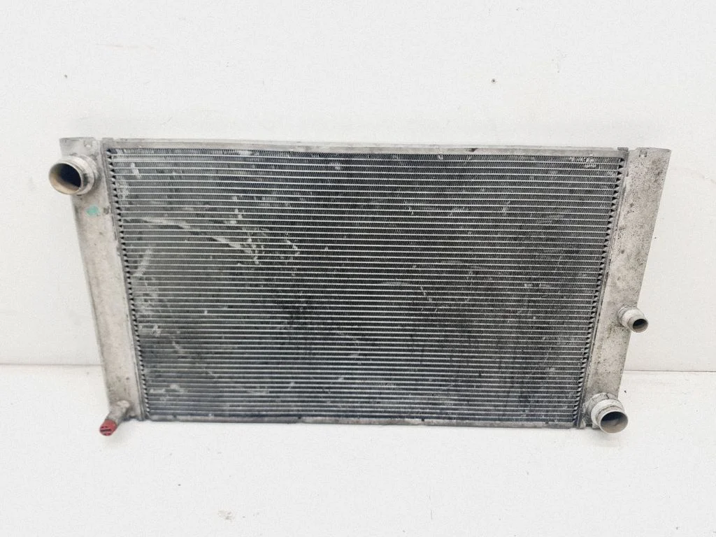 Coolant radiator 7795138