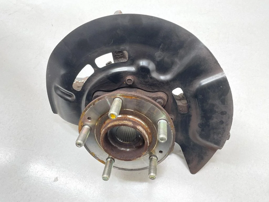 Front wheel hub spindle knuckle – front left