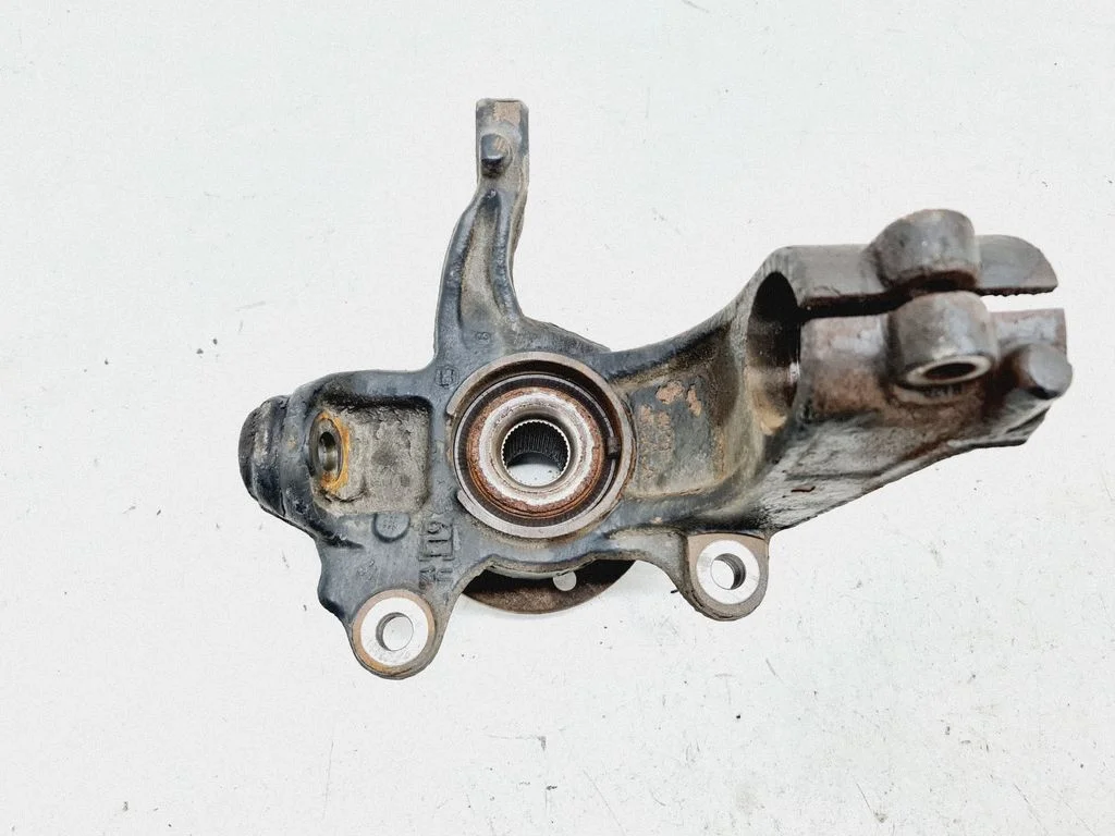 Front wheel hub spindle knuckle – front left