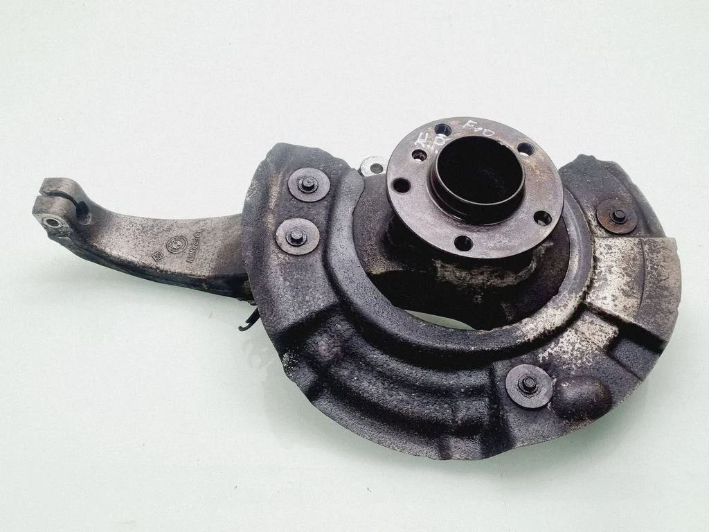 Front wheel hub spindle knuckle – front left
