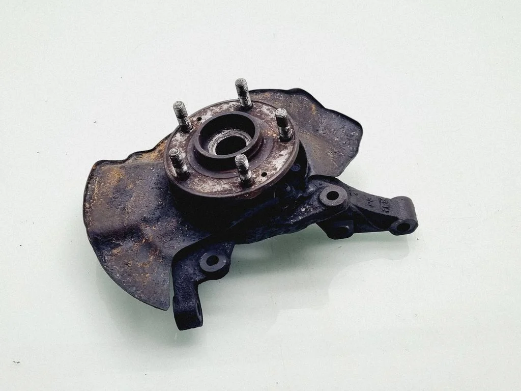Front wheel hub spindle knuckle – front left
