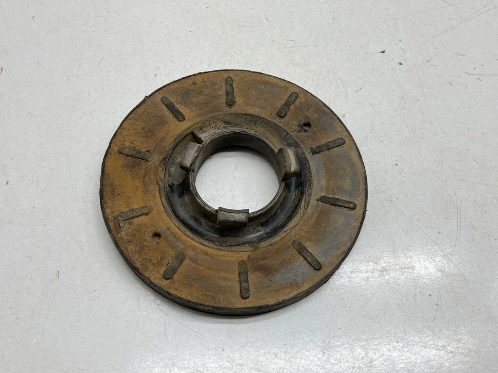Rear coil spring rubber mount – rear left