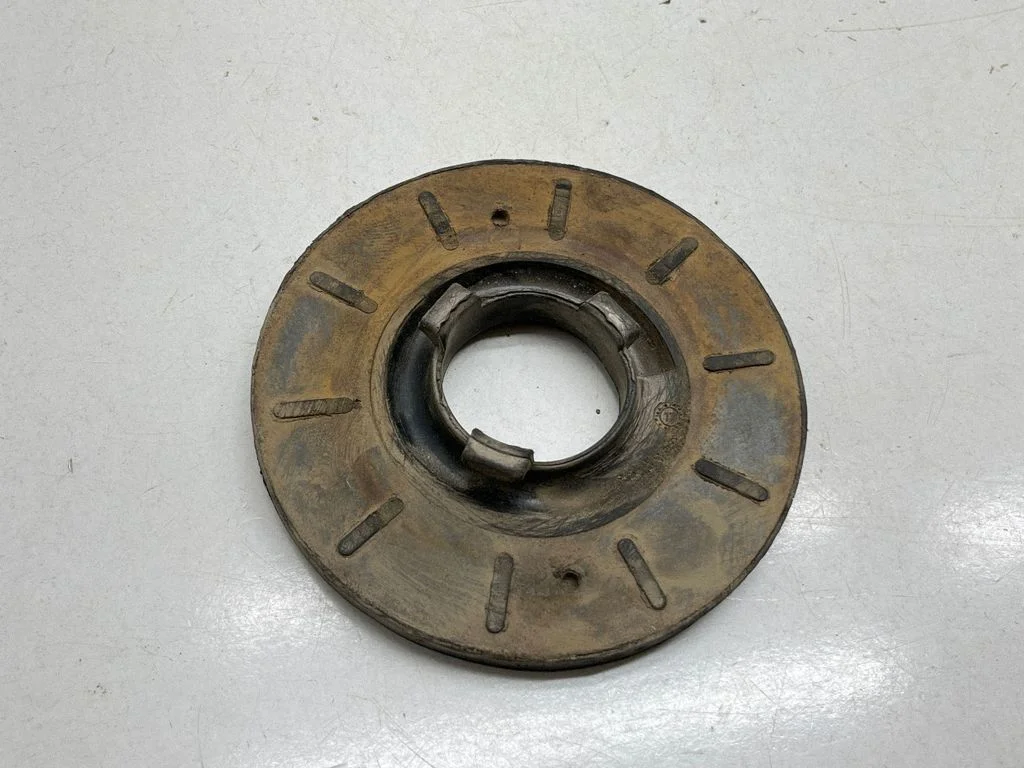 Rear coil spring rubber mount – rear right