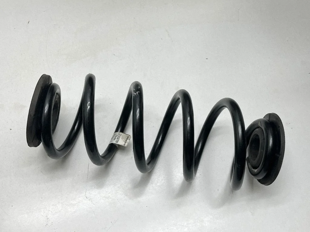 Rear coil spring rubber mount 31658709