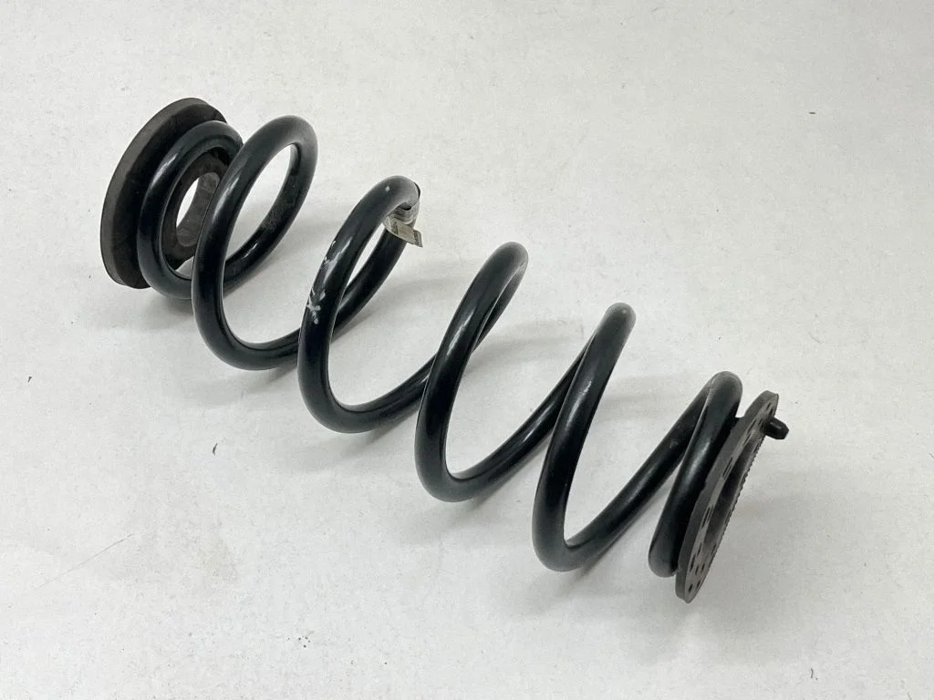 Rear coil spring rubber mount 31658709