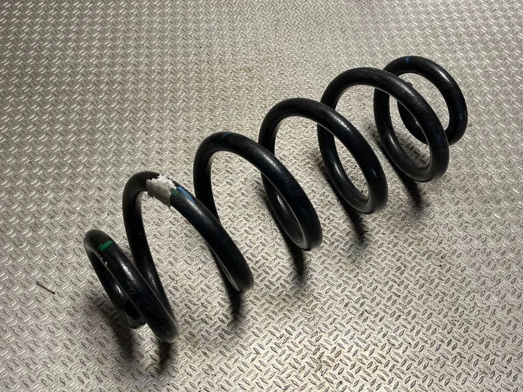 Rear coil spring 80A511115