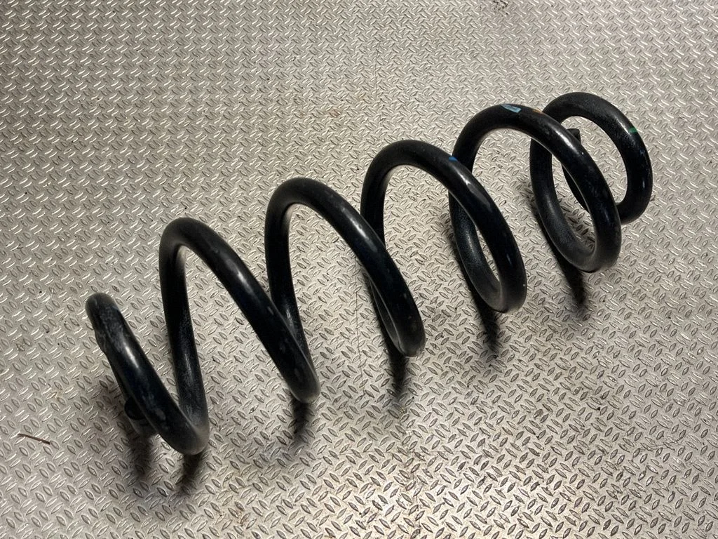 Rear coil spring 80A511115