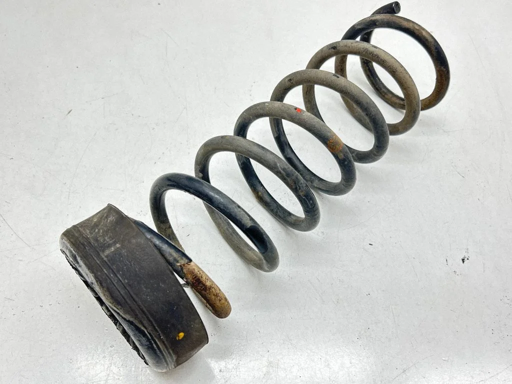 Rear coil spring – rear left