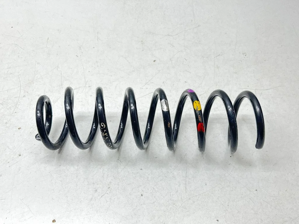 Rear coil spring – rear left