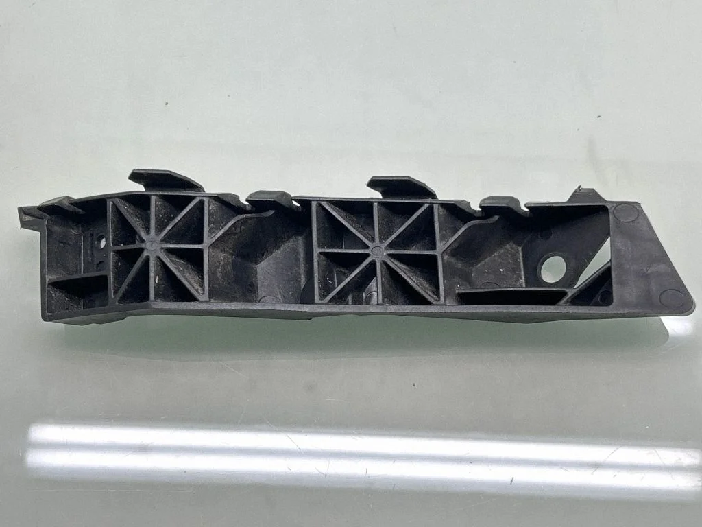 Front bumper mounting bracket 86514-F1000